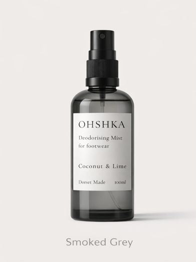OHSHKA Deodorising Mist in smoked grey glass bottle